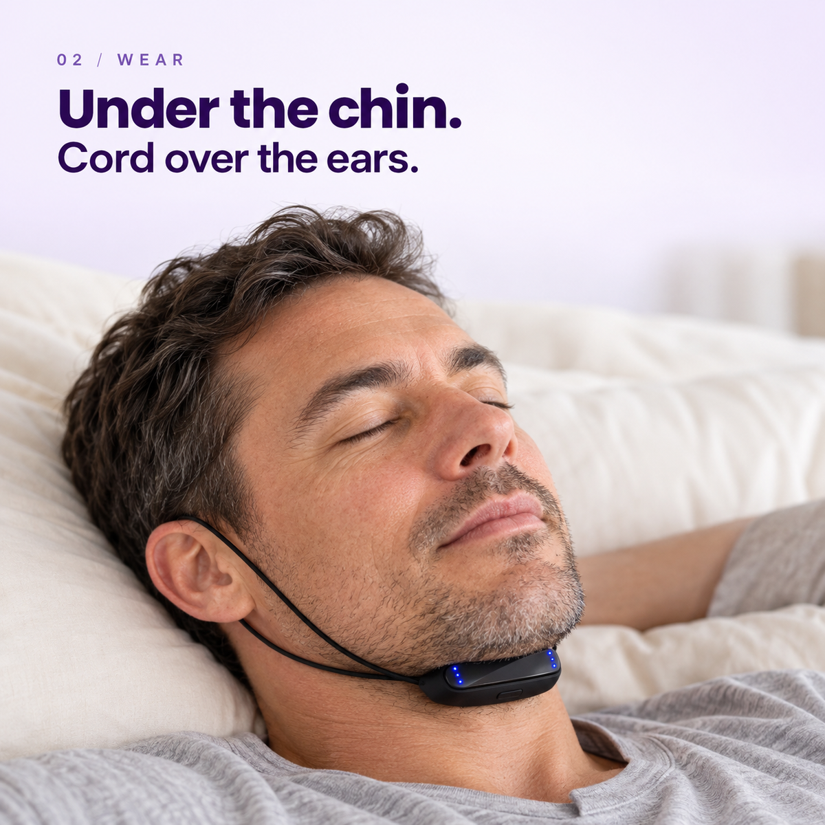 Step 2 Wear: QuietPulse positioned directly beneath the chin with the cord routed over the ears.